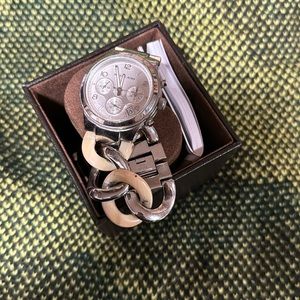 MK BRACELET WATCH. really different and unique.